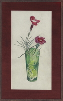 Two pink Carnations in a green glass
