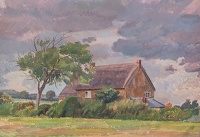 Farmhouse with tree and clouded sky