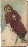 Young girl seated on a wall
