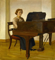 Rosamond Ley seated at her piano